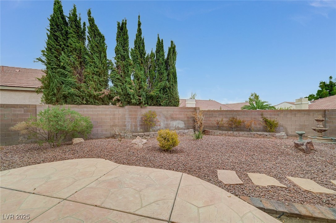 6012 Prospector Trail Las Vegas, NV 89118 - Photo 61 of 73 Fenced backyard featuring a patio area