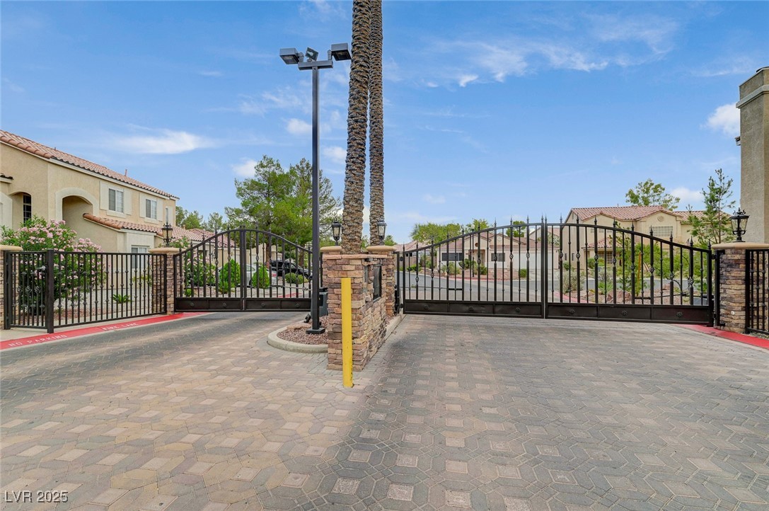 6012 Prospector Trail Las Vegas, NV 89118 - Photo 70 of 73 Gate with a residential view