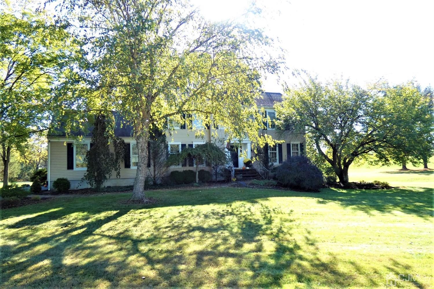 14 Apple Tree Road Flemington, NJ 08822 - Photo 1 of 33 a view of a yard with plants and large trees