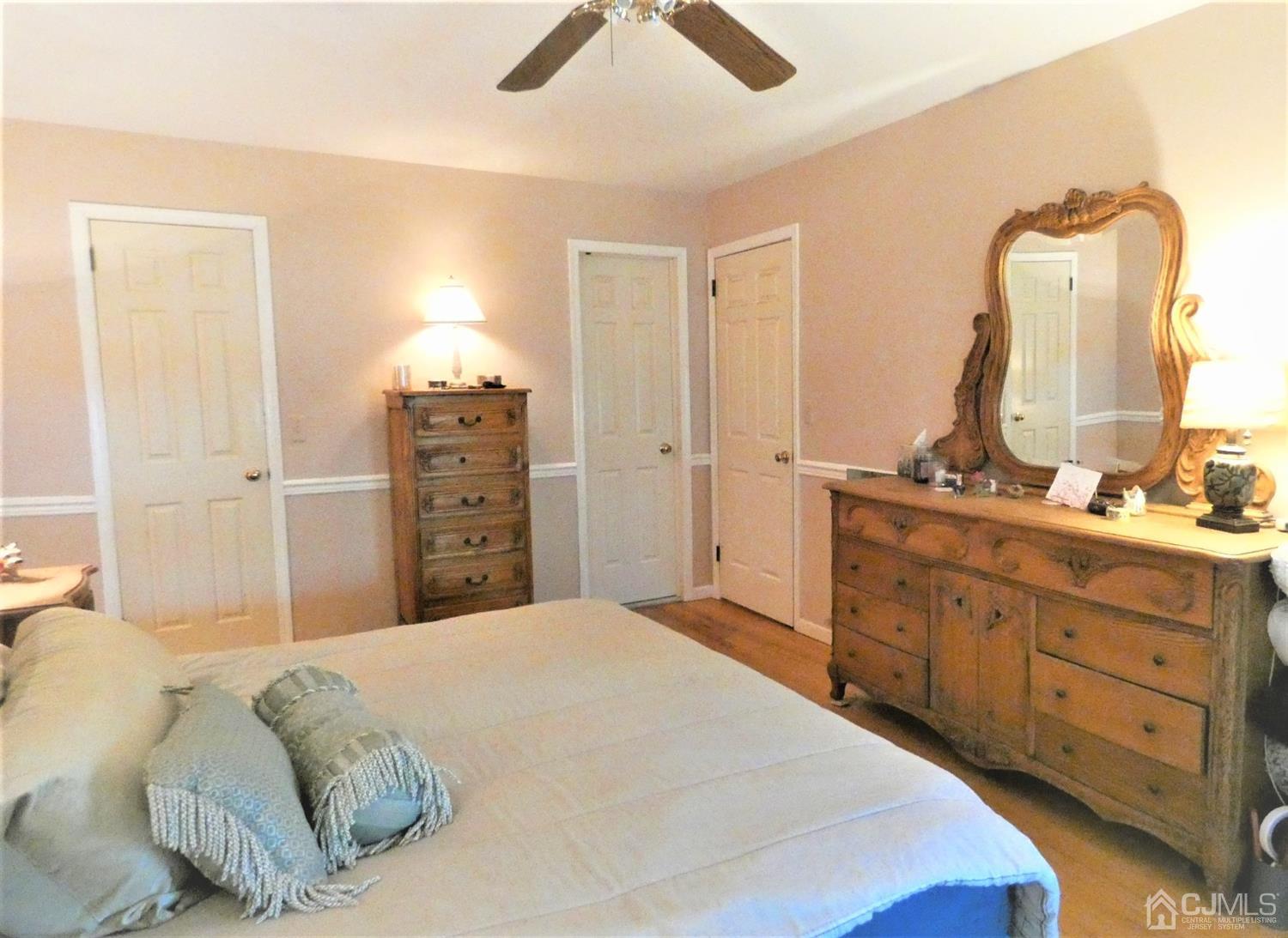 14 Apple Tree Road Flemington, NJ 08822 - Photo 17 of 33 a spacious bedroom with a bed and a dresser