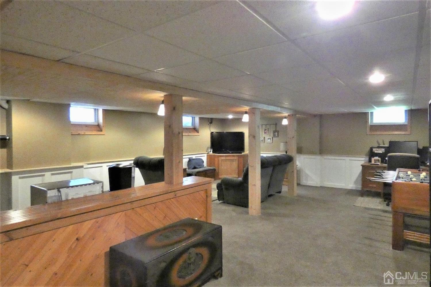 14 Apple Tree Road Flemington, NJ 08822 - Photo 28 of 33 a lobby with furniture and a table