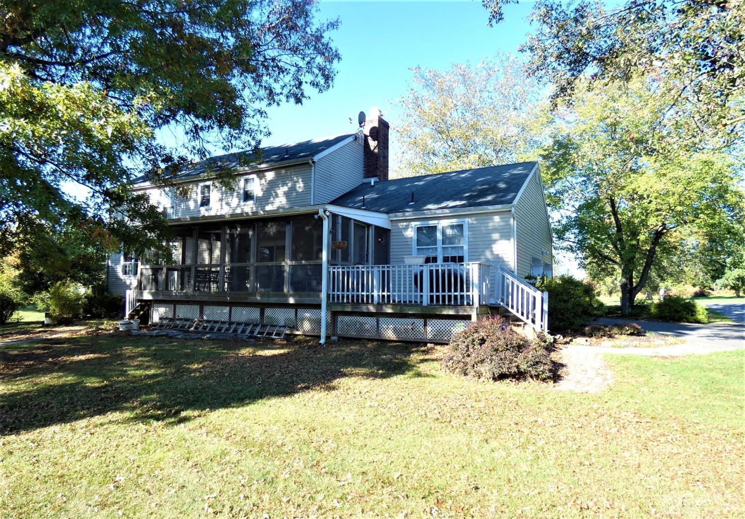 14 Apple Tree Road Flemington, NJ 08822 - Photo 29 of 33 a front view of a house with a yard patio and fire pit