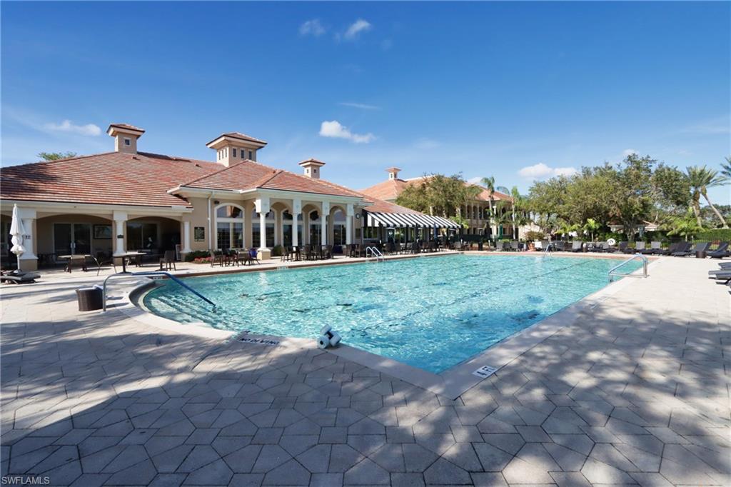 5963 Trophy Drive, Unit 2002 Naples, FL 34110 - Photo 23 of 33 a view of a house with a yard