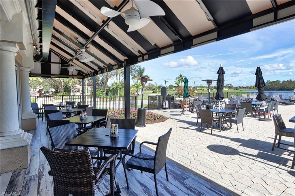 5963 Trophy Drive, Unit 2002 Naples, FL 34110 - Photo 27 of 33 a view of a dining room with furniture window and outside view