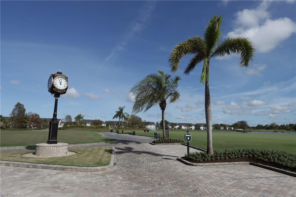 5963 Trophy Drive, Unit 2002 Naples, FL 34110 - Photo 28 of 33 a park with water view and palm trees