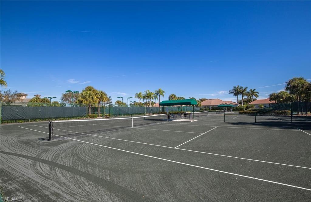 5963 Trophy Drive, Unit 2002 Naples, FL 34110 - Photo 31 of 33 a view of a tennis court