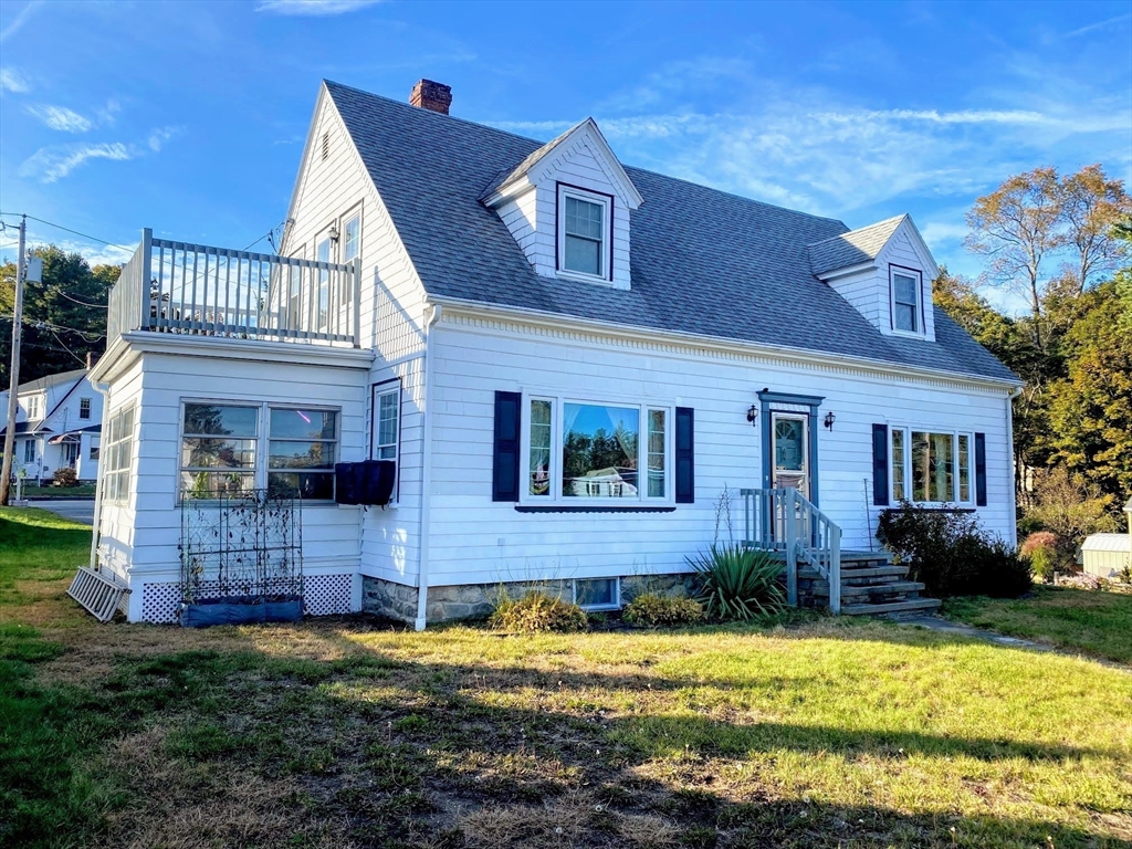 4 Charlton Road Dudley, MA 01571 - Photo 1 of 24 a view of a house with a swimming pool