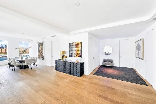 a bedroom with a bed and a cabinets