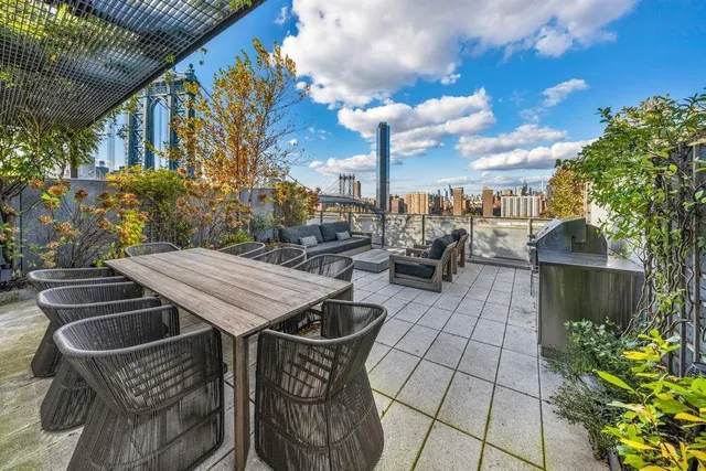 a room with a white walls and a fireplace