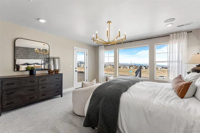 a bed room with a bed and a night stand