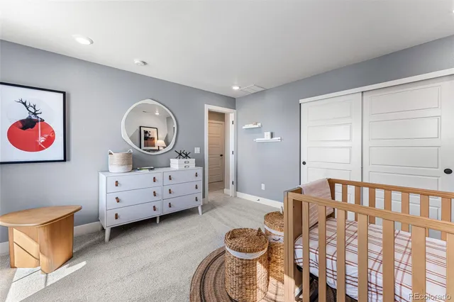 an aerial view of a house with outdoor space