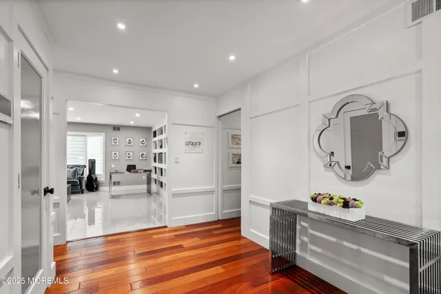 a very nice looking room with wooden floor