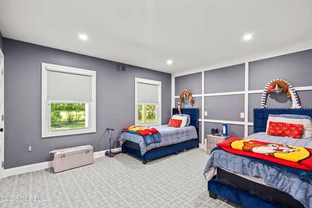 a white toilet sitting next to a shower