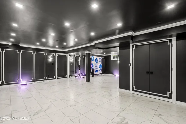 a bed room with two beds and a chair