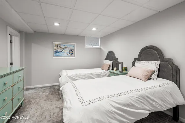 a utility room with lots of dryer and washer