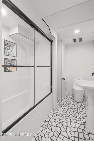 a view of living room with furniture and a window