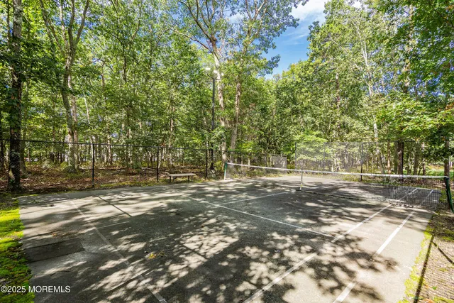 an aerial view of residential houses with city view
