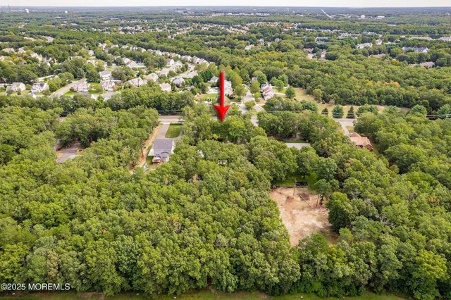 a picture of a bathroom with a shower