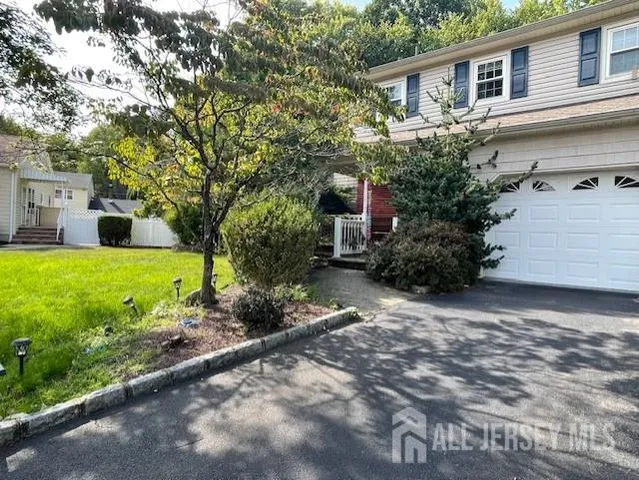a view of a backyard with garden