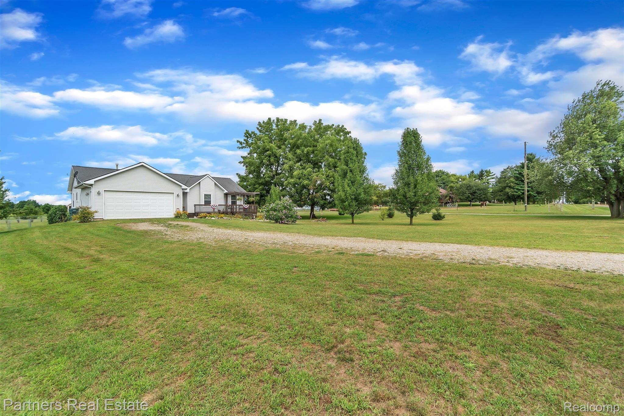9637 North Marsh Road Fowlerville, MI 48836 - Photo 38 of 46 41-9637 N Marsh Rd-windowstill-real.jpg