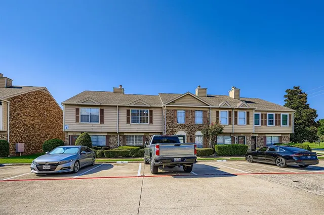 a car parked in front of a house