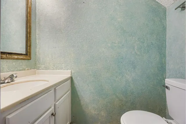 a bathroom with a sink and a toilet