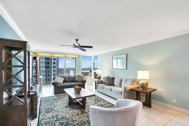 a spacious bedroom with a bed and wooden floor