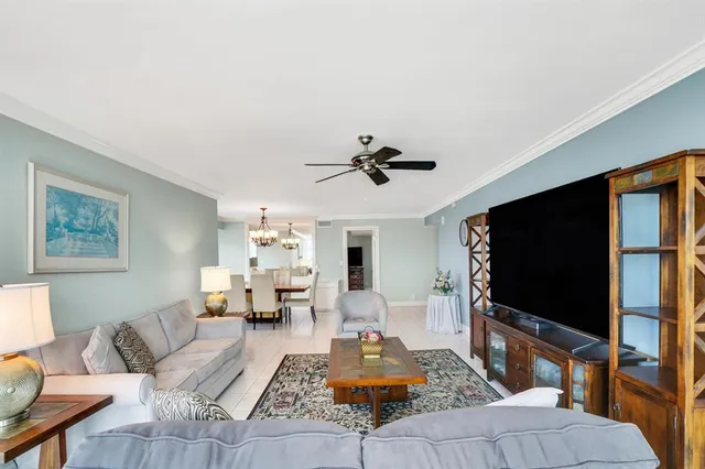 a view of walk in closet with clothes