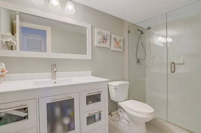 a view of a patio with a table and chairs