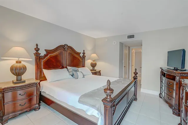 a view of a swimming pool with a lounge chairs