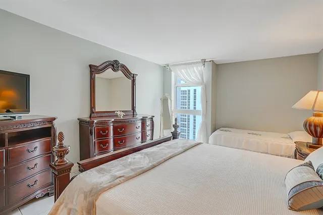 a view of a sign board with yard