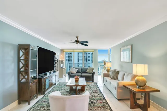 a kitchen with a refrigerator and a sink
