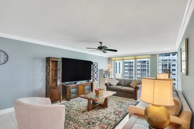a kitchen with white cabinets and appliances