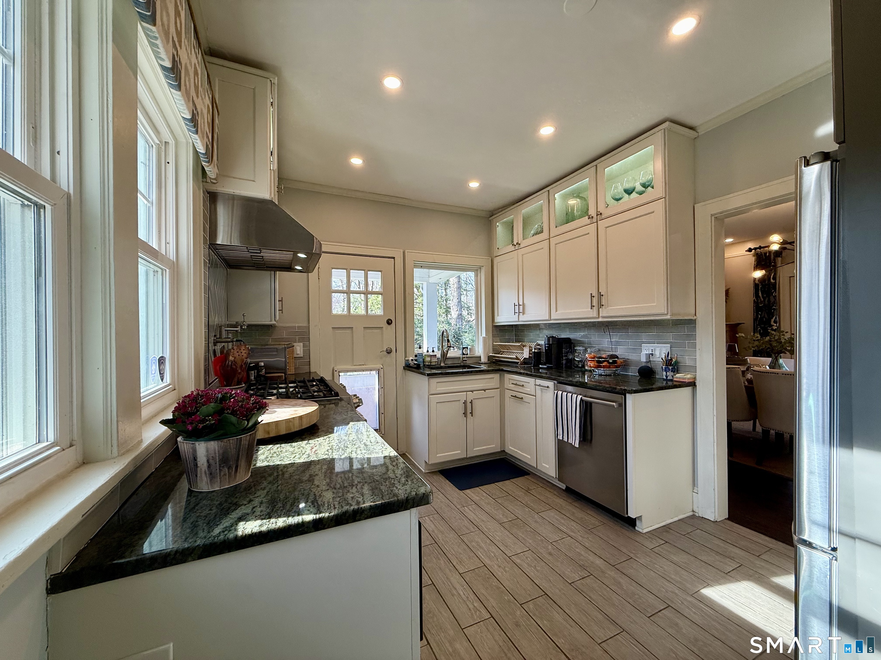12 Sunset Pass Wilton, CT 06897 - Photo 12 of 31 a kitchen with a sink stainless steel appliances and window