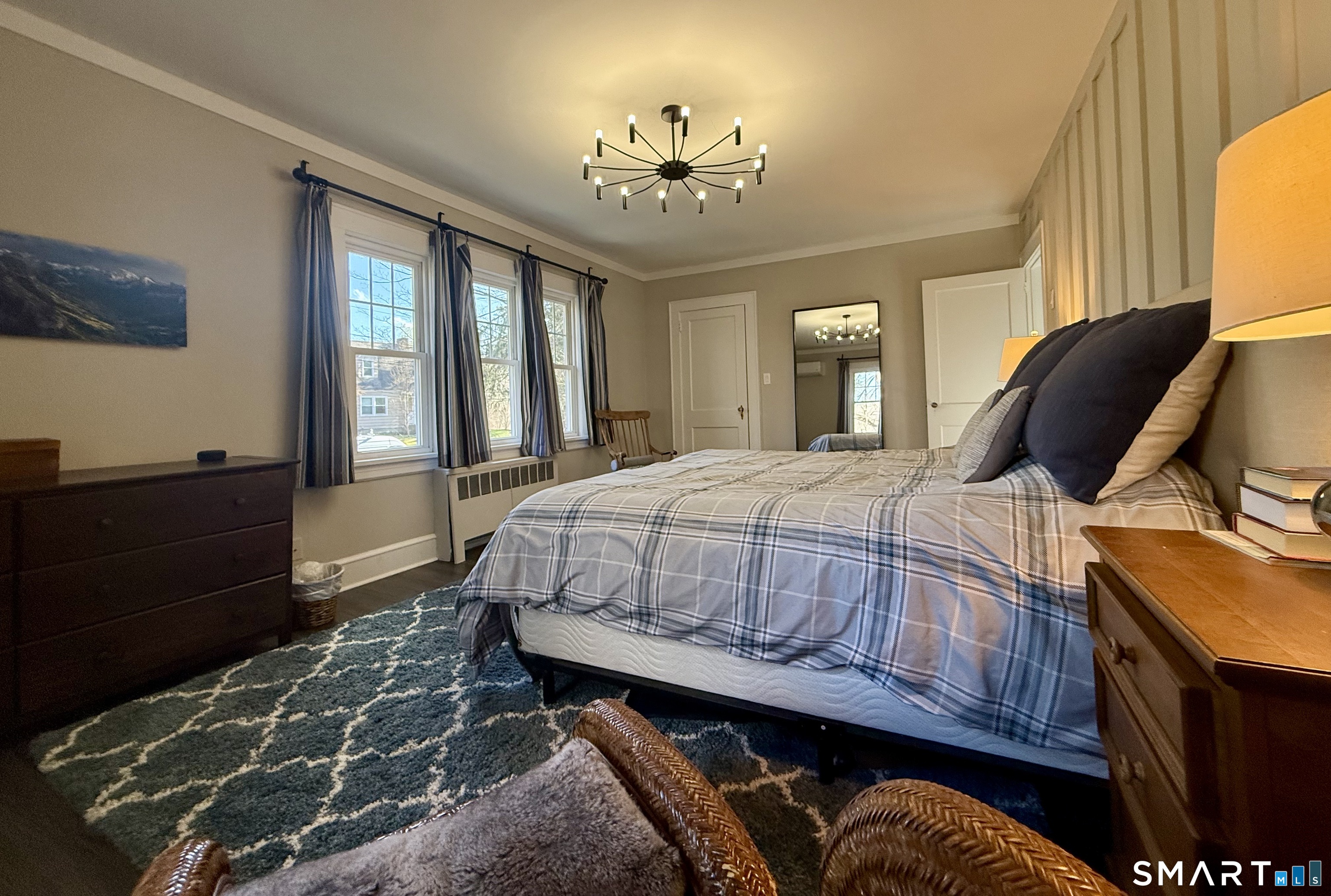 12 Sunset Pass Wilton, CT 06897 - Photo 18 of 31 a bedroom with a bed window and dresser