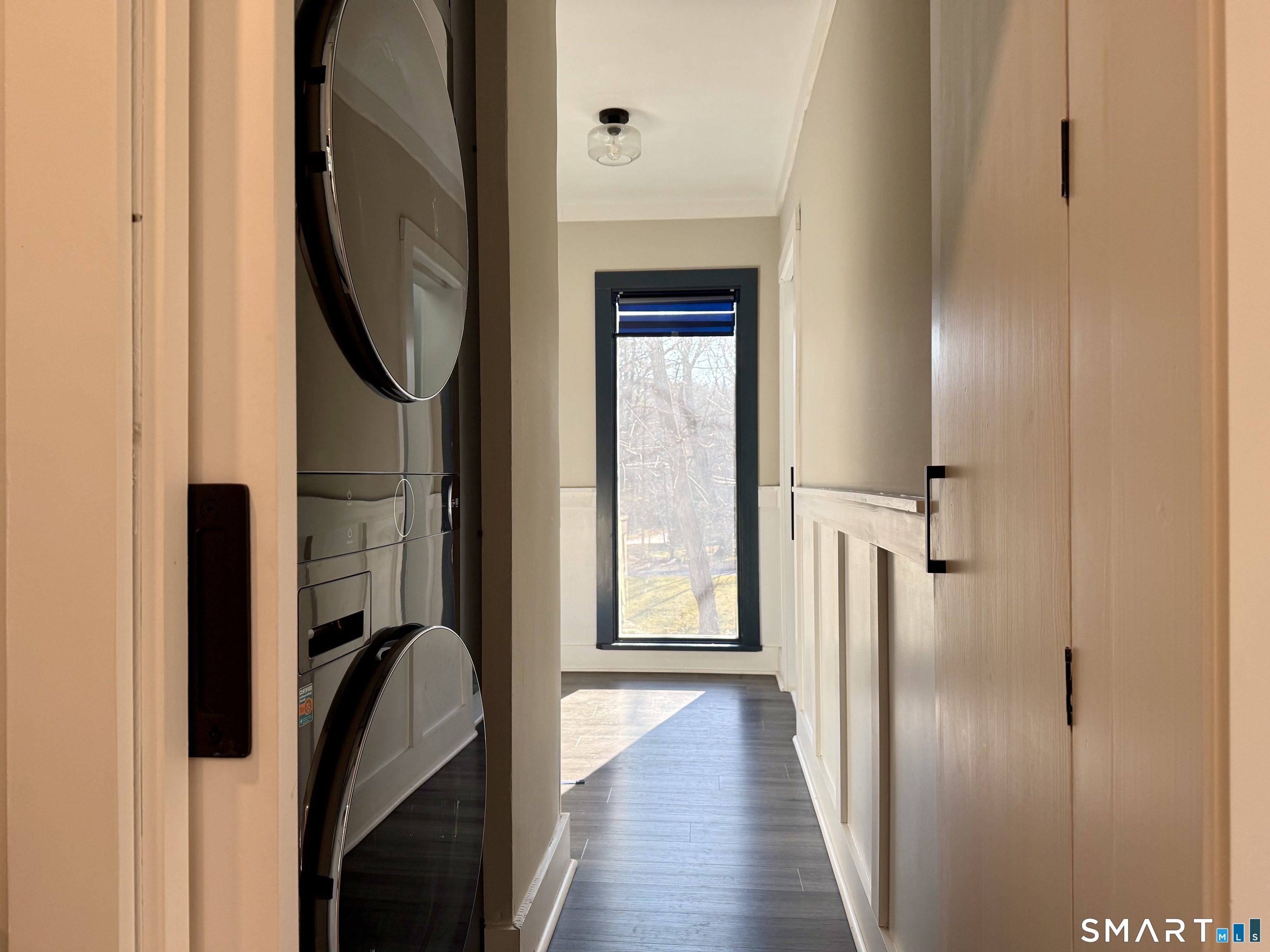 12 Sunset Pass Wilton, CT 06897 - Photo 19 of 31 a view of a mirror of a house with wooden floor