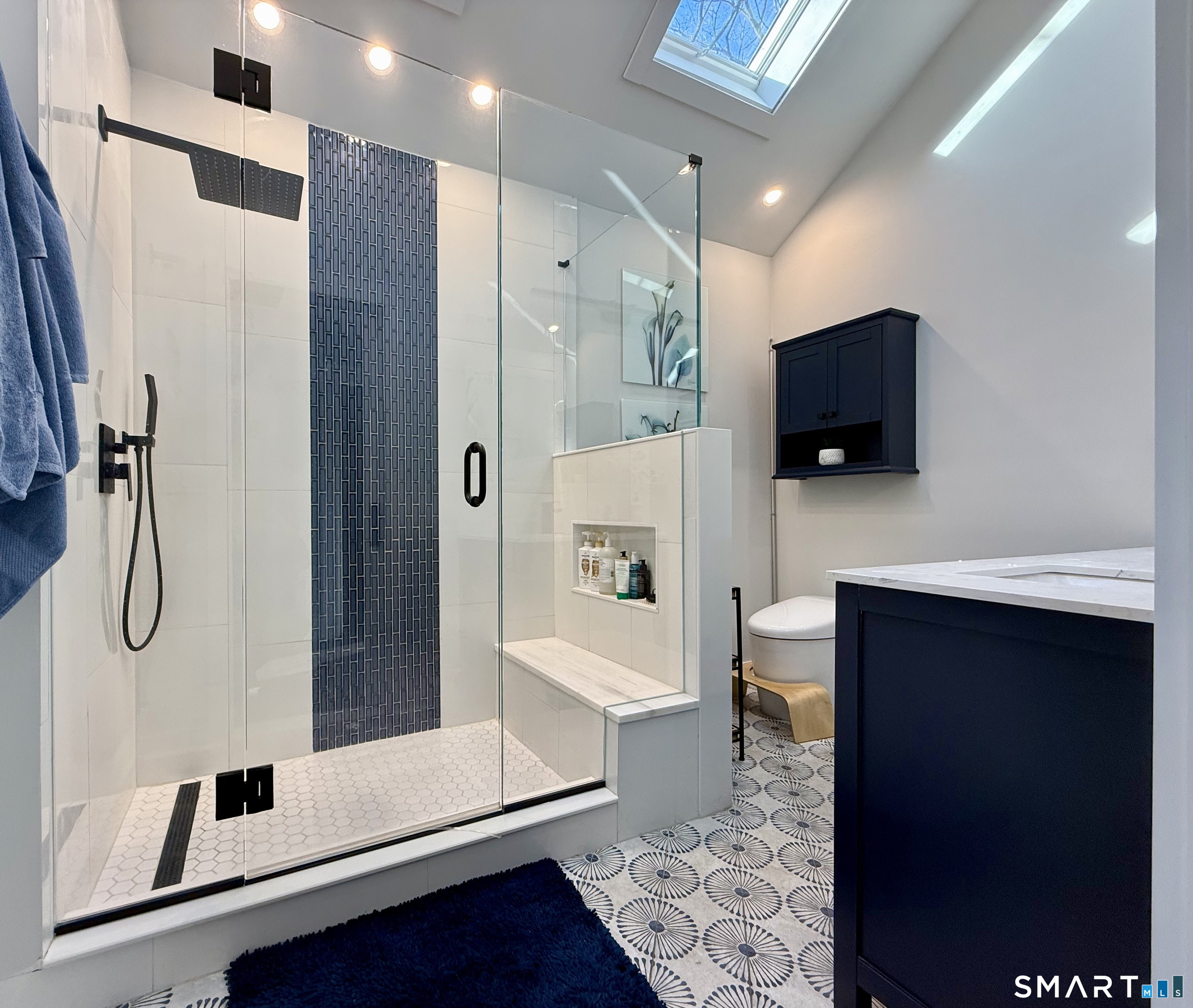 12 Sunset Pass Wilton, CT 06897 - Photo 21 of 31 a bathroom with a bathtub and a shower
