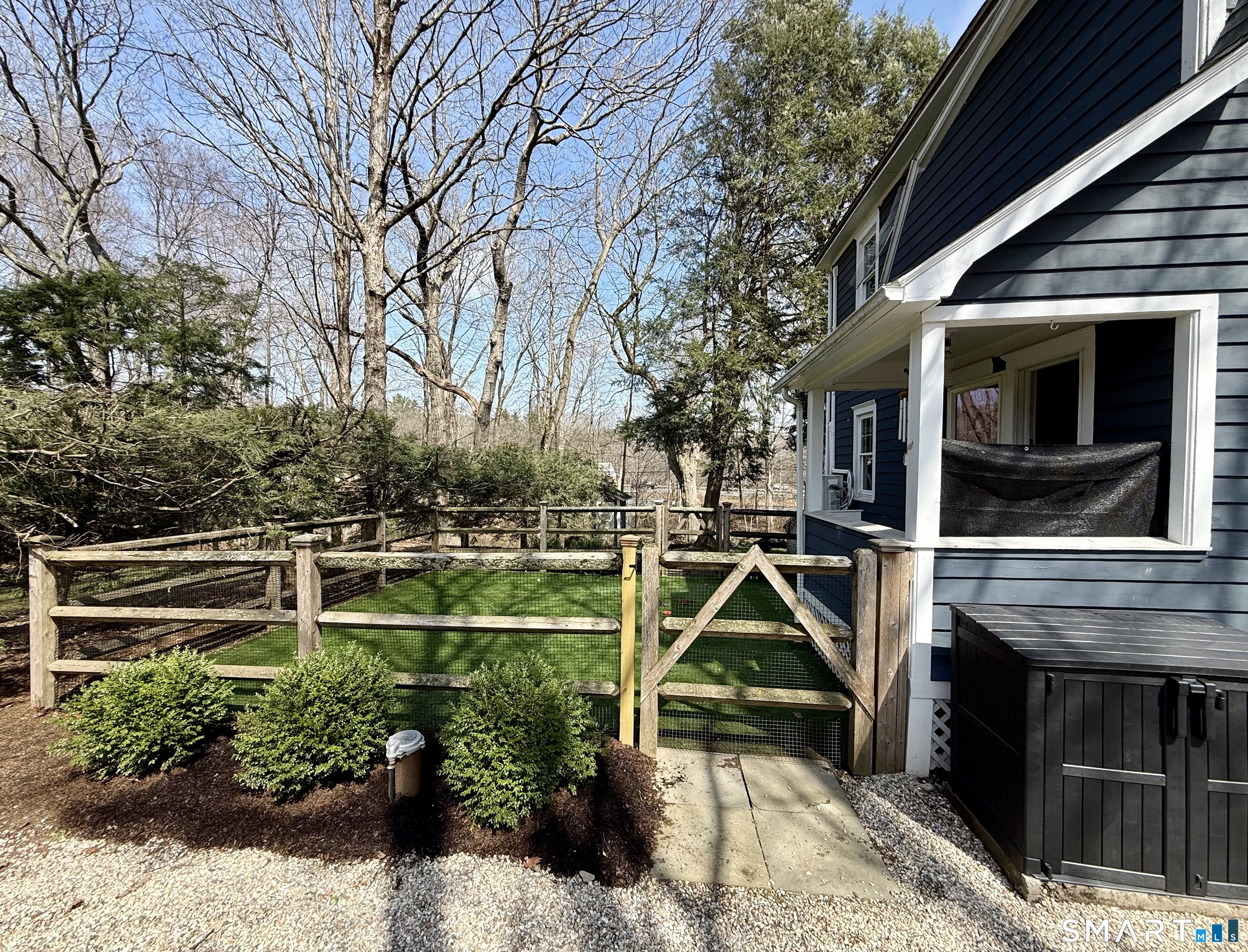 12 Sunset Pass Wilton, CT 06897 - Photo 26 of 31 a front view of a house with a yard