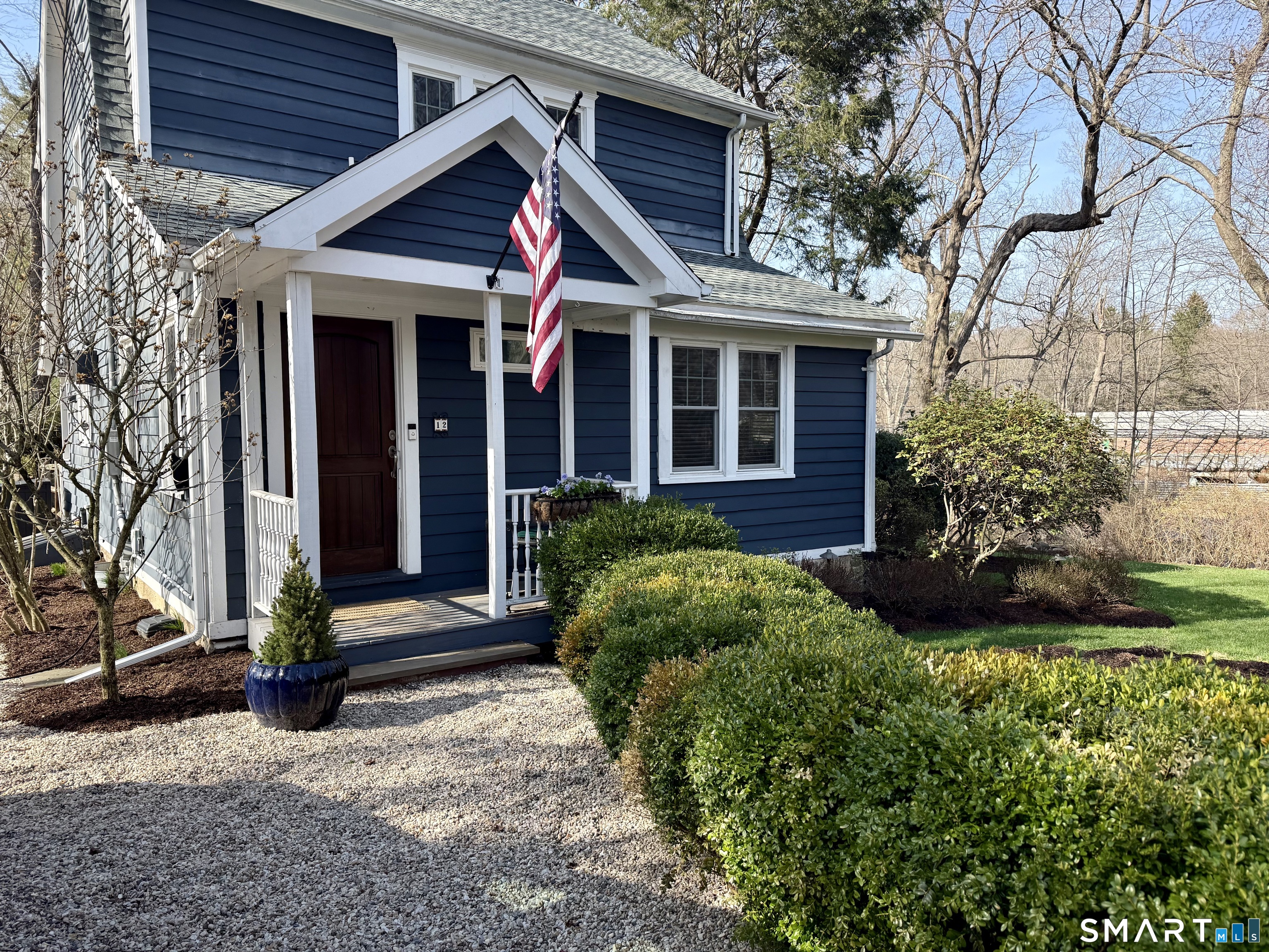 12 Sunset Pass Wilton, CT 06897 - Photo 28 of 31 front view of a house with a yard