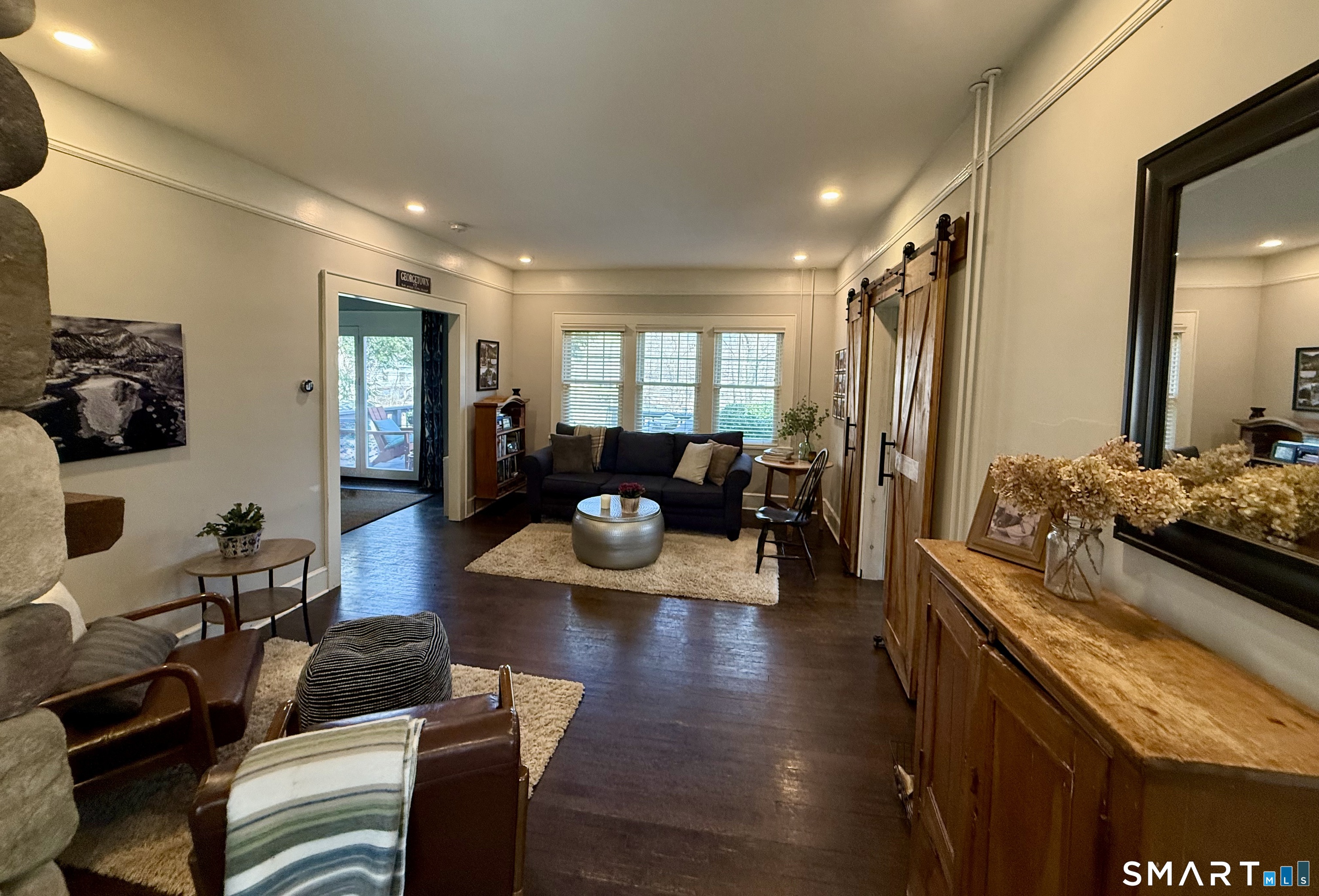 12 Sunset Pass Wilton, CT 06897 - Photo 3 of 31 a living room with furniture and a wooden floor