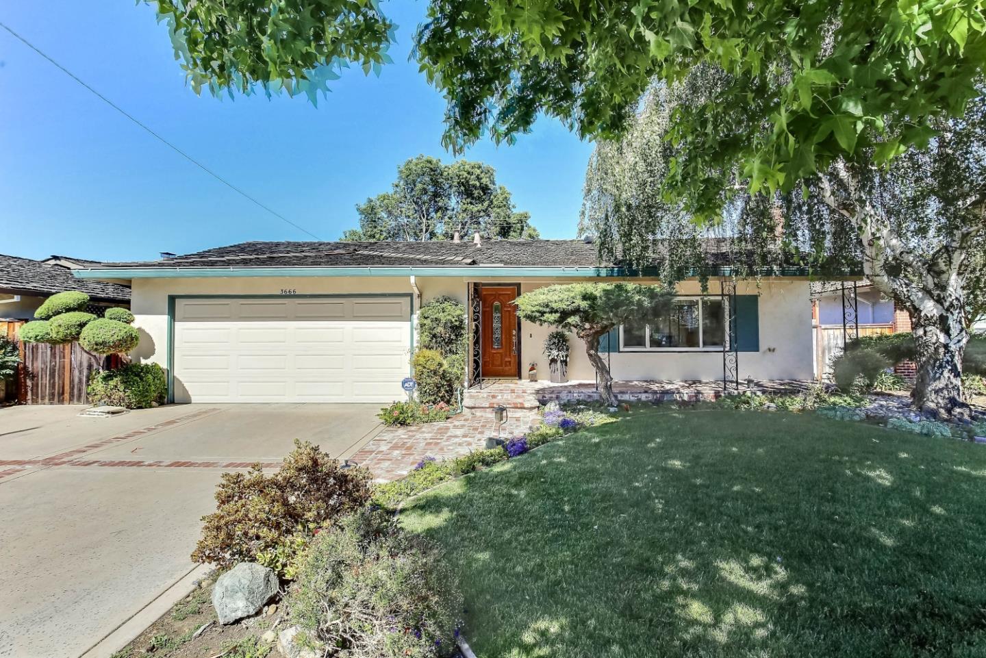 3666 Kirk Road San Jose, CA 95124 - Photo 1 of 13 front view of a house with a garden