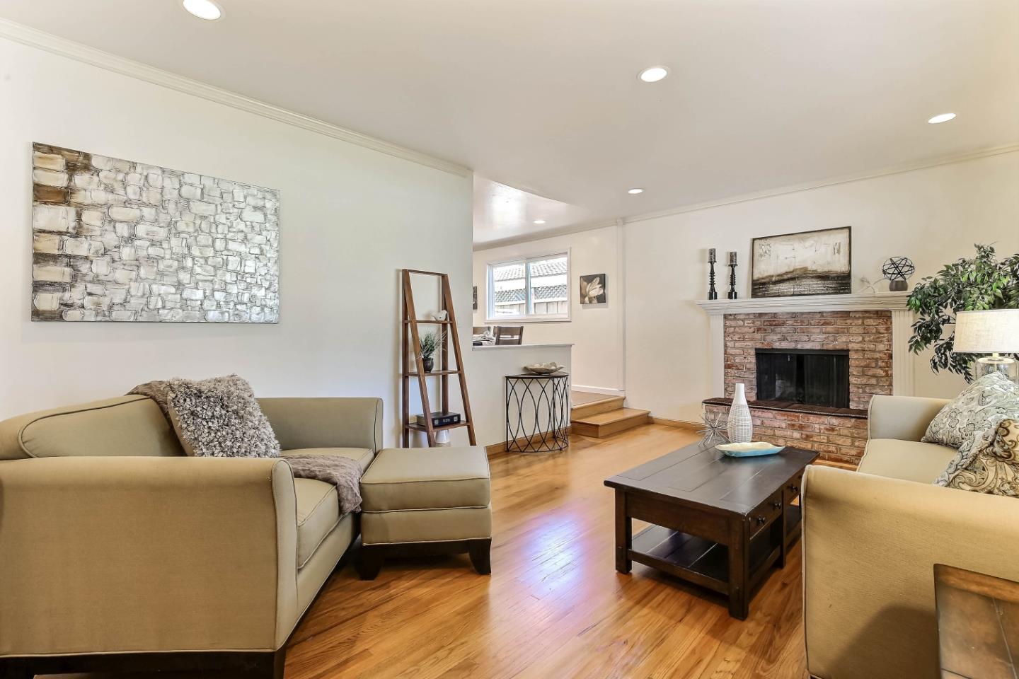 3666 Kirk Road San Jose, CA 95124 - Photo 2 of 13 a living room with furniture and a fireplace
