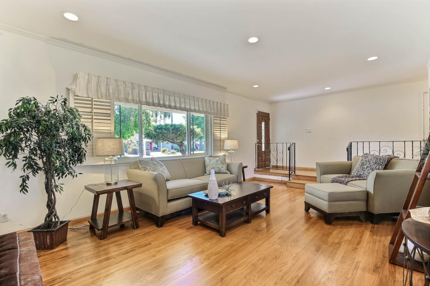 3666 Kirk Road San Jose, CA 95124 - Photo 3 of 13 a living room with fireplace furniture and a large window