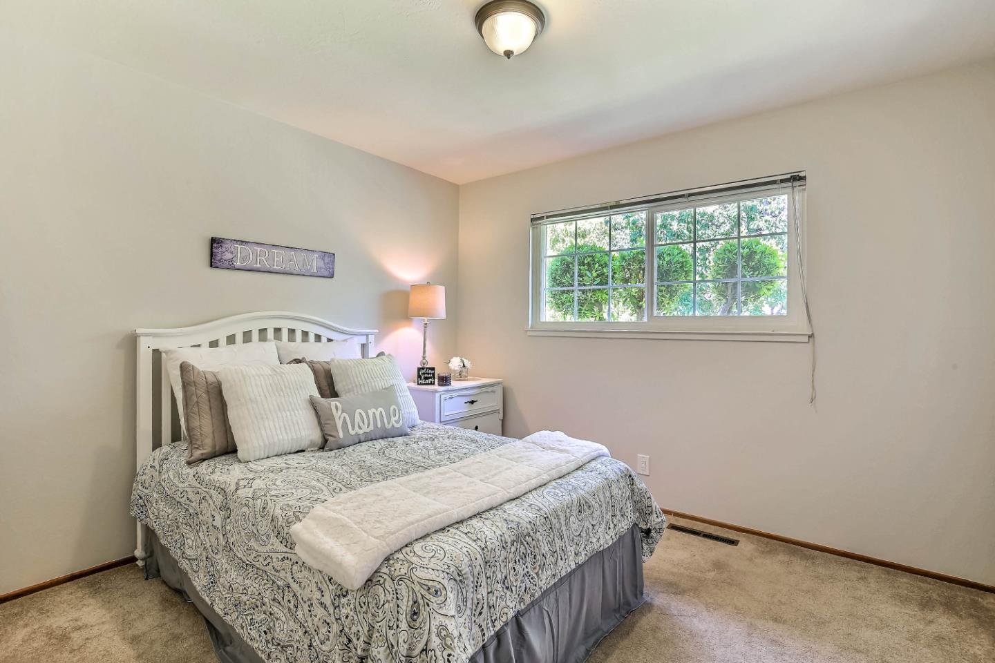 3666 Kirk Road San Jose, CA 95124 - Photo 10 of 13 a bedroom with a bed and a window