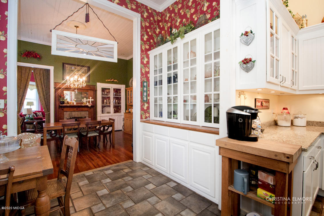 6807 Houston Road Macon, GA 31216 - Photo 8 of 38 a view of a kitchen and dining area