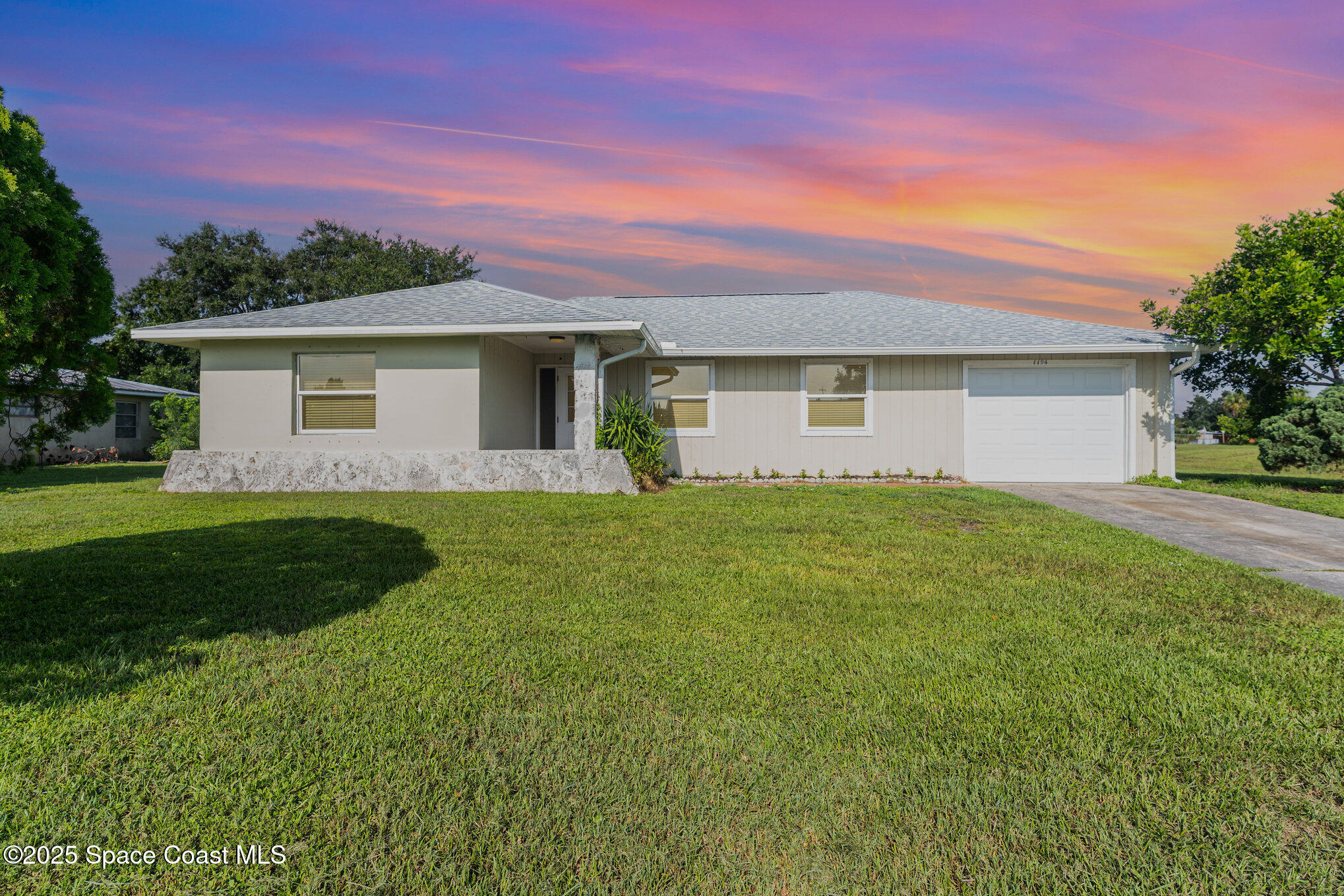 1194 Cotton Road Northeast Palm Bay, FL 32905 - Photo 1 of 33 001__amp3638-edit-edit_559
