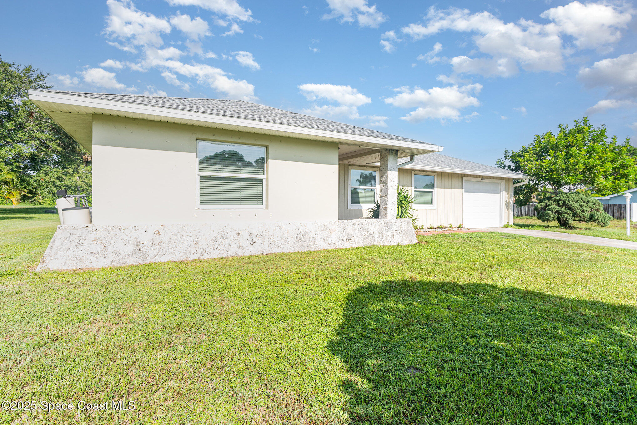 1194 Cotton Road Northeast Palm Bay, FL 32905 - Photo 3 of 33 003__amp3640-edit_276