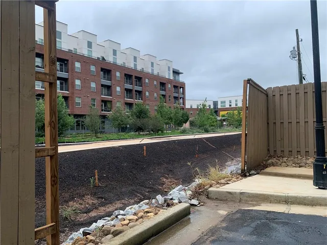 a view of a cafe with an outdoor seating
