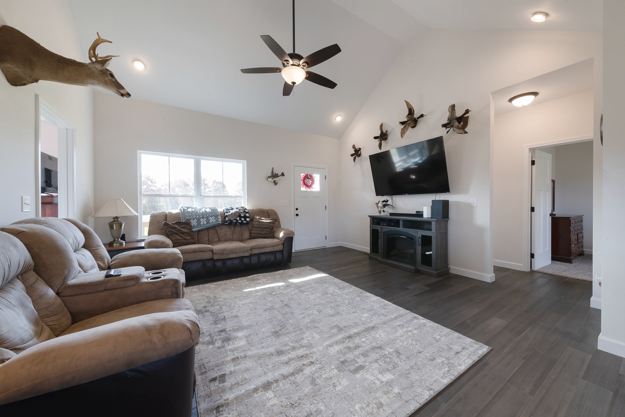 425 Pruett Road Dickson, TN 37055 - Photo 13 of 31 a living room with furniture and a flat screen tv