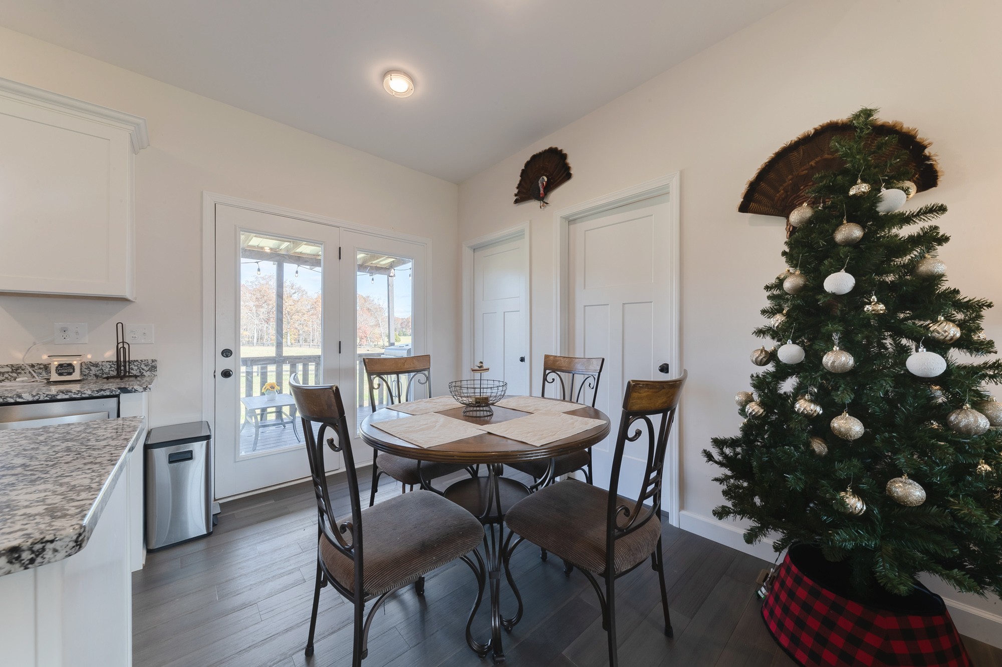 425 Pruett Road Dickson, TN 37055 - Photo 16 of 31 a view of a dining room with furniture and wooden floor